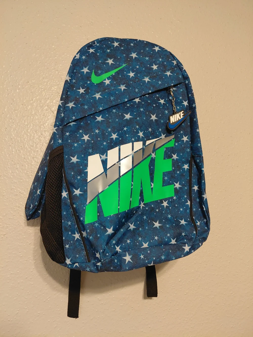 Nike Blue Star Print Backpack with Neon Green Logo